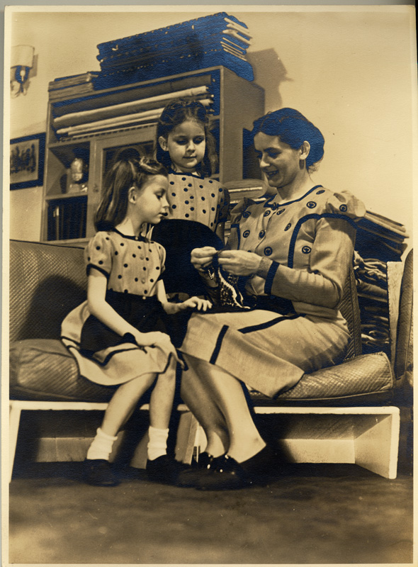 Mariska Karasz sewing with Solveig and Rosamond, ca. 1939
Photograph, 9 1/8 x 6 11/16 inches